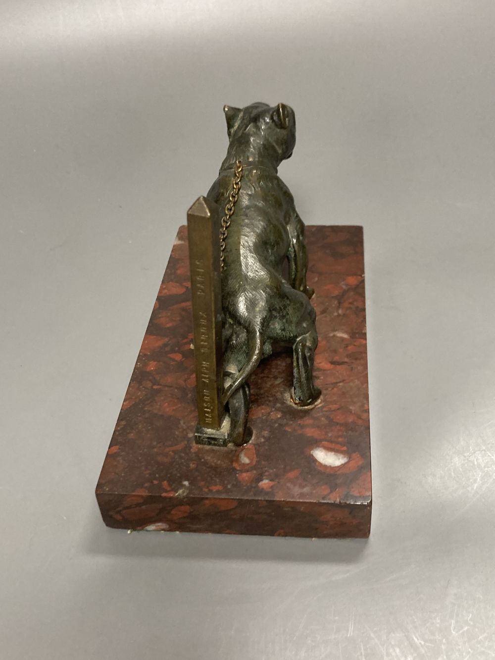 Attributed to Maison Alphonse Giroux - a cast bronze model of a chain tethered Mastiff, on rouge marble plinth, post impressed Maison A